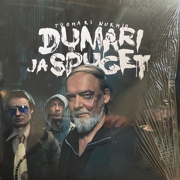 Tuomari Nurmio – Dumari Ja Spuget